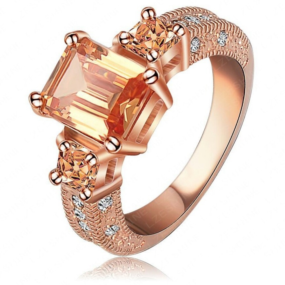 Elegant Gold and Amber Emerald Cut Ring